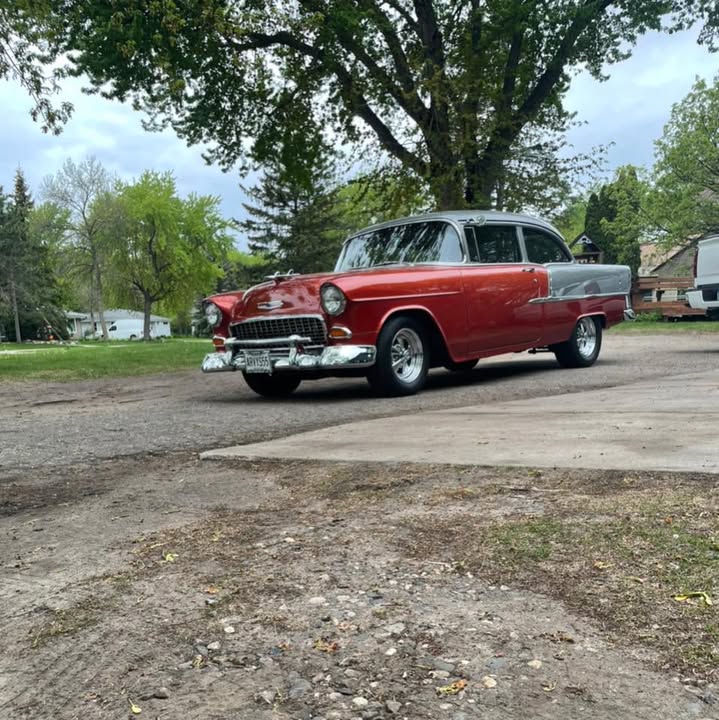 A red and white classic car shared by Hake’s Auto