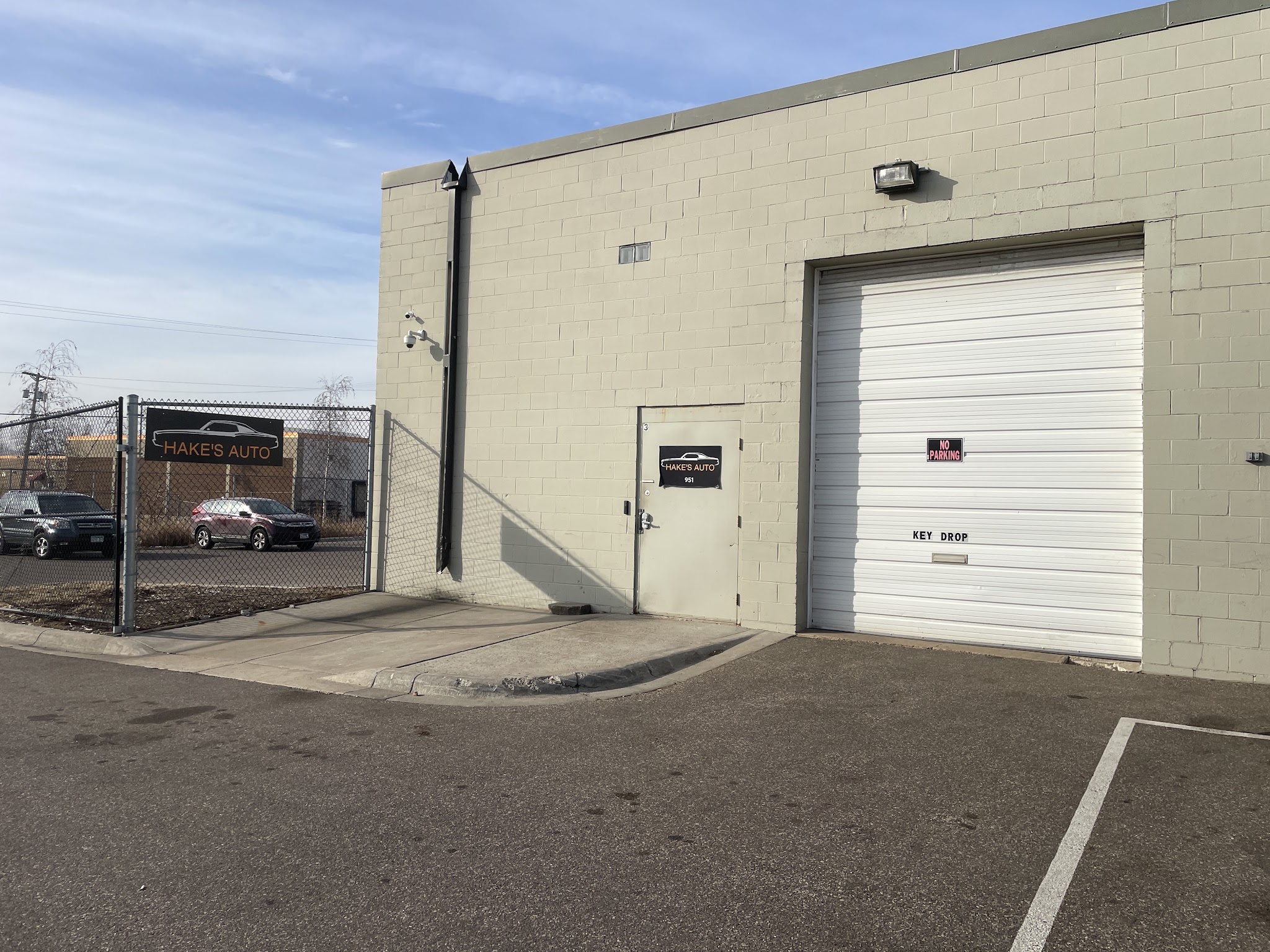 Hake’s Auto signs at the garage entrance on American Boulevard